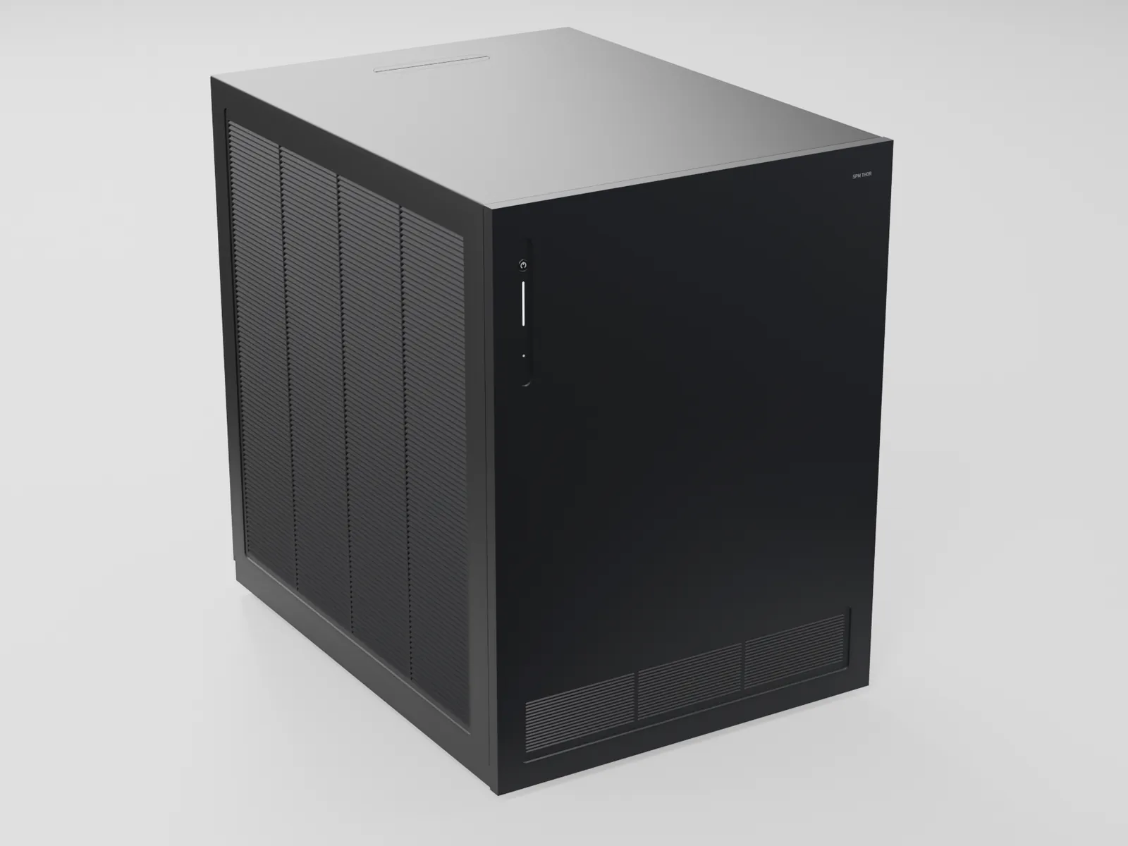 SPM Thor from the front left: a matte black cube with louvred side panels, a flush handle in the top and a slim control strip on the front